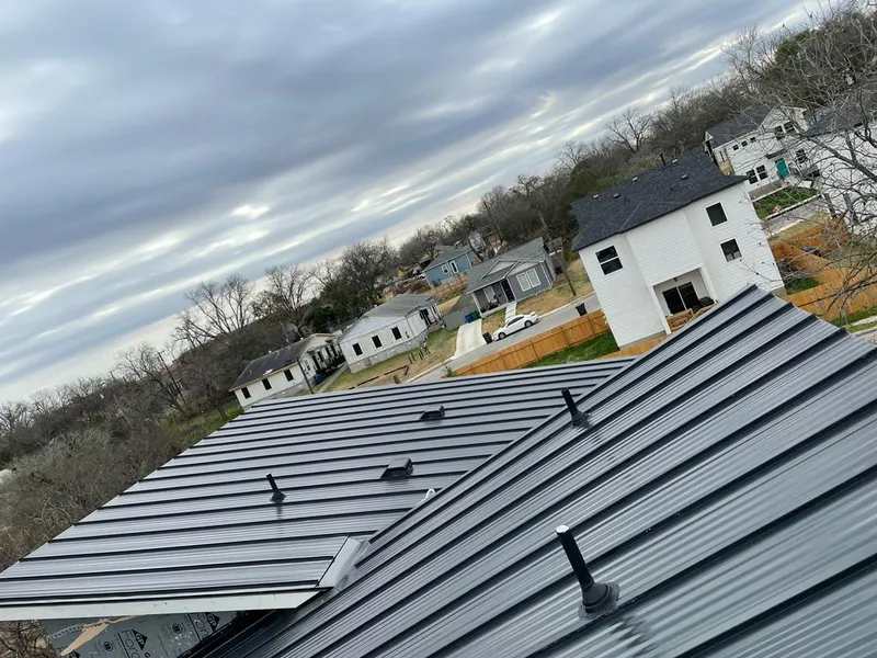 Standing seam metal roof panels with vents for Skylight Repair in Waterboro